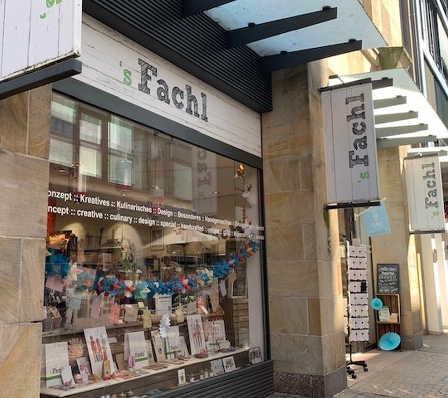 Natlie breaking pieces with a tool for mosaic art