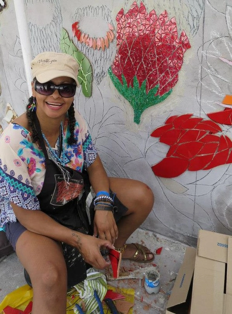 Natlie making Flowers Mosaic art