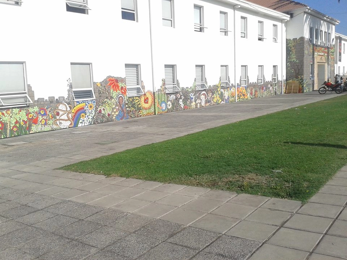 Natlie Ann Löffler, Mosaic art on a building's walls