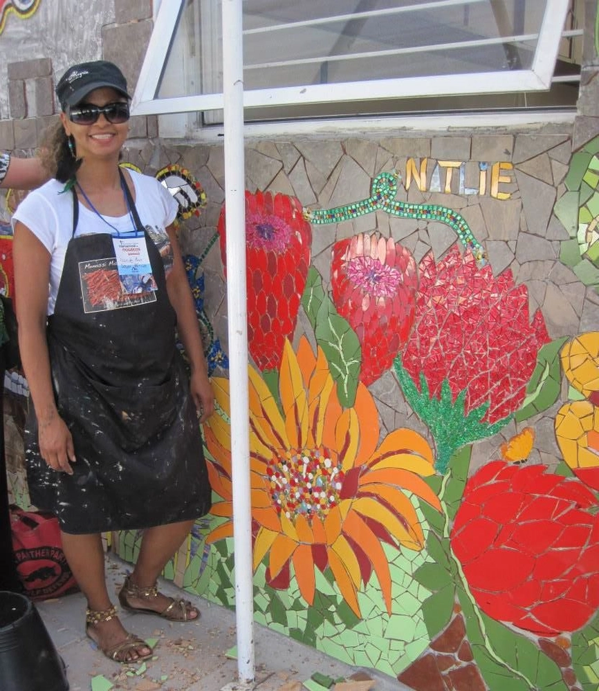 Natlie Ann Löffler, Mosaic art on a building's walls